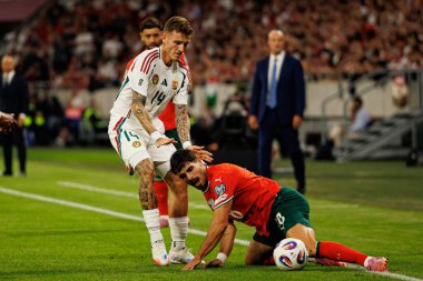 Bendeguz Bolla and Ruben Neves seen  during World Cup 2026 European qualification game between national teams of Hungary and Poland (Maciej Rogowski/ Ball Raw Images)