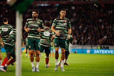 Ruben Neves and Cristiano Ronaldo seen  during World Cup 2026 European qualification game between national teams of Hungary and Poland (Maciej Rogowski/ Ball Raw Images)
