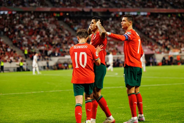 Bernardo Silva, Cristiano Ronaldo and Joao Cancelo seen celebrating after goal  during World Cup 2026 European qualification game between national teams of Hungary and Poland (Maciej Rogowski/ Ball Raw Images)