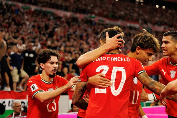 Players of Portugal seen celebrating after goal from Joao Cancelo  during World Cup 2026 European qualification game between national teams of Hungary and Poland (Maciej Rogowski/ Ball Raw Images)
