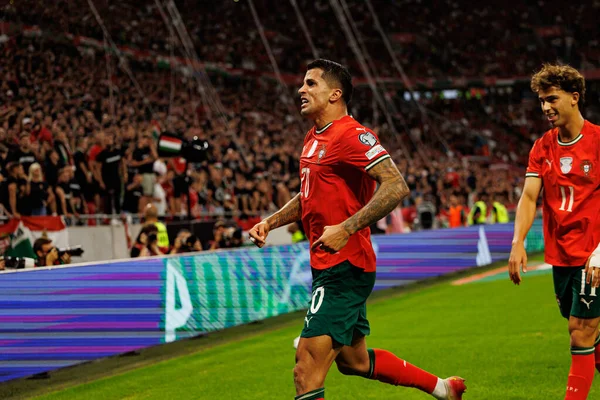 Joao Cancelo and Joao Felix seen celebrating after scoring goal during World Cup 2026 European qualification game between national teams of Hungary and Poland (Maciej Rogowski/ Ball Raw Images)