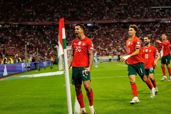 Joao Cancelo and Joao Felix seen celebrating after scoring goal during World Cup 2026 European qualification game between national teams of Hungary and Poland (Maciej Rogowski/ Ball Raw Images)