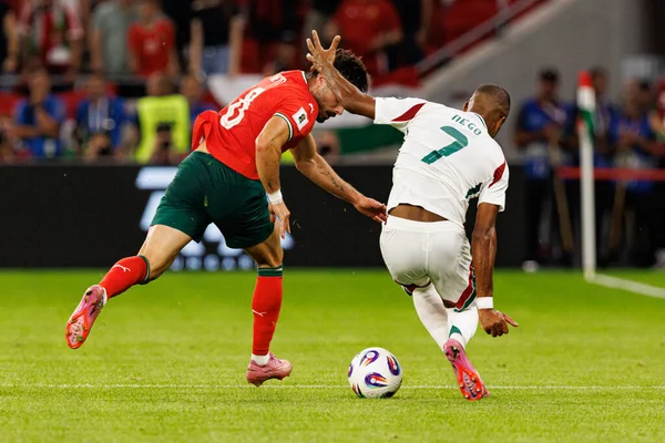 Pedro Neto and Loic Nego seen  during World Cup 2026 European qualification game between national teams of Hungary and Poland (Maciej Rogowski/ Ball Raw Images)