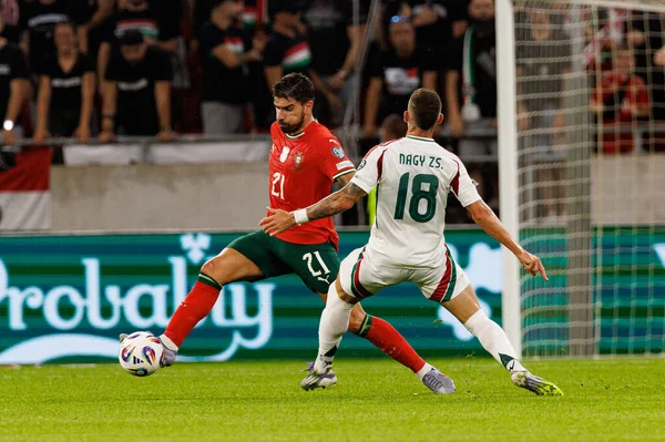 Ruben Neves and Zsolt Nagy seen  during World Cup 2026 European qualification game between national teams of Hungary and Poland (Maciej Rogowski/ Ball Raw Images)