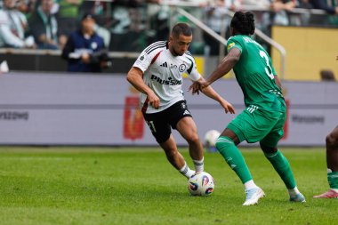  Vahan Bichakhchyan and Josh Wilson - Esbrand seen during PKO BP Ekstraklasa 25 26 game between teams of Legia Warszawa and Radomiak Radom at Wojska Polskiego Stadium (Maciej Rogowski/Ball Raw Images)