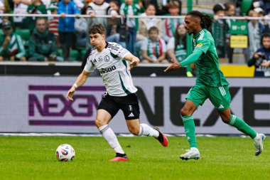Noah Weisshaupt and Vasco Lopes seen during PKO BP Ekstraklasa 25 26 game between teams of Legia Warszawa and Radomiak Radom at Wojska Polskiego Stadium (Maciej Rogowski/Ball Raw Images)