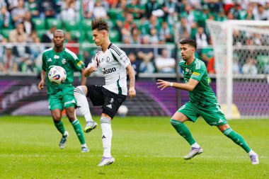 Kacper Urbanski and Roberto Alves seen during PKO BP Ekstraklasa 25 26 game between teams of Legia Warszawa and Radomiak Radom at Wojska Polskiego Stadium (Maciej Rogowski/Ball Raw Images)