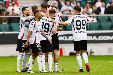 Players of Legia seen celebrating after goal from PAwel Wszolek during PKO BP Ekstraklasa 25 26 game between teams of Legia Warszawa and Radomiak Radom at Wojska Polskiego Stadium (Maciej Rogowski/Ball Raw Images)