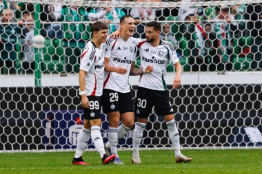 Players of Legia seen celebrating after goal during PKO BP Ekstraklasa 25 26 game between teams of Legia Warszawa and Radomiak Radom at Wojska Polskiego Stadium (Maciej Rogowski/Ball Raw Images)