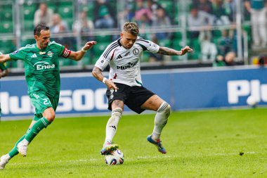 Rafal Wolski and Kamil Piatkowski seen during PKO BP Ekstraklasa 25 26 game between teams of Legia Warszawa and Radomiak Radom at Wojska Polskiego Stadium (Maciej Rogowski/Ball Raw Images)