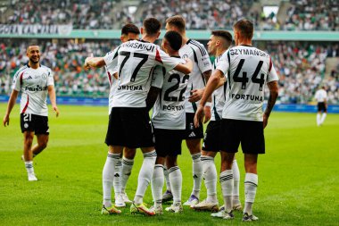 Players of Legia seen celebrating after goal during PKO BP Ekstraklasa 25 26 game between teams of Legia Warszawa and Radomiak Radom at Wojska Polskiego Stadium (Maciej Rogowski/Ball Raw Images)