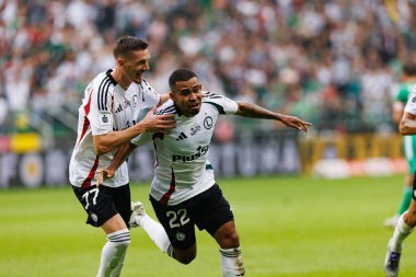 Ermal Krasniqi  and Juergen Elitim seen celebrating after scoring goal during PKO BP Ekstraklasa 25 26 game between teams of Legia Warszawa and Radomiak Radom at Wojska Polskiego Stadium (Maciej Rogowski/Ball Raw Images)