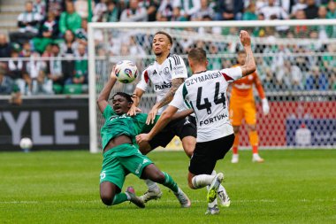 Abdoul Tapsoba and Steve Kapuadi seen during PKO BP Ekstraklasa 25 26 game between teams of Legia Warszawa and Radomiak Radom at Wojska Polskiego Stadium (Maciej Rogowski/Ball Raw Images)