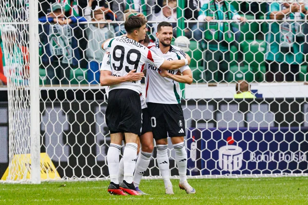Players of Legia seen celebrating after goal during PKO BP Ekstraklasa 25 26 game between teams of Legia Warszawa and Radomiak Radom at Wojska Polskiego Stadium (Maciej Rogowski/Ball Raw Images)