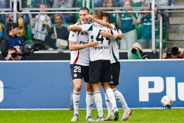 Players of Legia seen celebrating after goal from Damian Szymanski during PKO BP Ekstraklasa 25 26 game between teams of Legia Warszawa and Radomiak Radom at Wojska Polskiego Stadium (Maciej Rogowski/Ball Raw Images)
