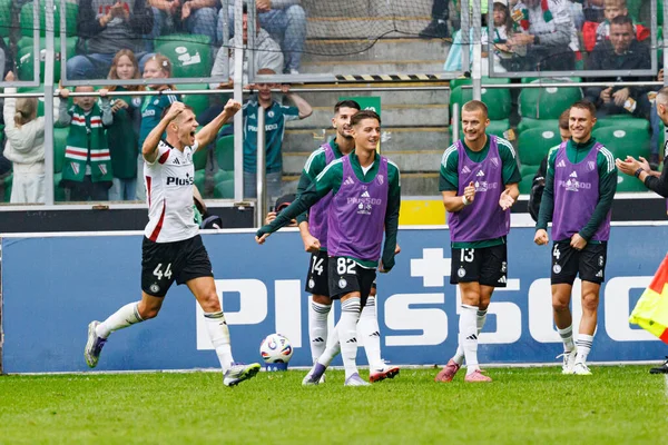 Damian Szymanski seen celebrating after scoring goal during PKO BP Ekstraklasa 25 26 game between teams of Legia Warszawa and Radomiak Radom at Wojska Polskiego Stadium (Maciej Rogowski/Ball Raw Images)