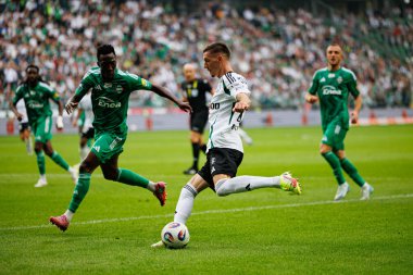 Zie Outtara and Ermal Krasniqi seen during PKO BP Ekstraklasa 25 26 game between teams of Legia Warszawa and Radomiak Radom at Wojska Polskiego Stadium (Maciej Rogowski/Ball Raw Images)