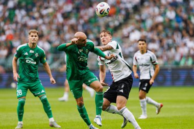 Jeremy Blasco and Mileta Rajovic seen during PKO BP Ekstraklasa 25 26 game between teams of Legia Warszawa and Radomiak Radom at Wojska Polskiego Stadium (Maciej Rogowski/Ball Raw Images)
