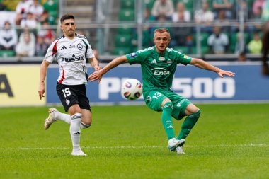 Ruben Vinagre and Jan Grzesik seen during PKO BP Ekstraklasa 25 26 game between teams of Legia Warszawa and Radomiak Radom at Wojska Polskiego Stadium (Maciej Rogowski/Ball Raw Images)