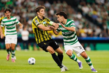 Aleksandr Martynovich and Pedro Goncalves seen during Champions League 25 26 league phase game between Sporting CP and FC Kairat Almaty (Maciej Rogowski/ Ball Raw Images)