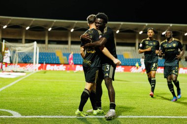 Jeremy Livolant and Oluwakorede Osundina seen celebrating after scoring goal during Liga Portugal game between teams of Casa Pia and FC Famalicao at Estadio Municipal Rio Maior (Maciej Rogowski/Ball Raw Images)
