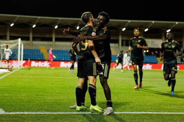 Jeremy Livolant and Oluwakorede Osundina seen celebrating after scoring goal during Liga Portugal game between teams of Casa Pia and FC Famalicao at Estadio Municipal Rio Maior (Maciej Rogowski/Ball Raw Images)