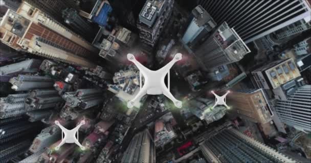 AERİAL. İnsansız hava araçları grubunun üst görüntüsü malları Hong Kong şehrinin arka planında sunuyor.. — Stok video
