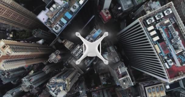 AERIAL. Top view of Drone delivers the goods against the background of Hong Kong city. — Stock Video