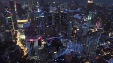 Kuala Lumpur 'un dijital ağ bağlantı hatları. Finansal bölge ve Asya 'nın akıllı kentsel kentindeki iş merkezleri. Geceleri gökdelen ve yüksek binalar.