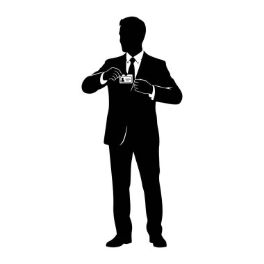 Beyaz arka planda takım elbiseli ve kravatlı bir adamın siyah silueti gösteriliyor. Üzerinde bir resim ve metin olan beyaz bir kimlik kartı tutuyor ve onu sunuyor gibi görünüyor. Adam soluna bakıyor..