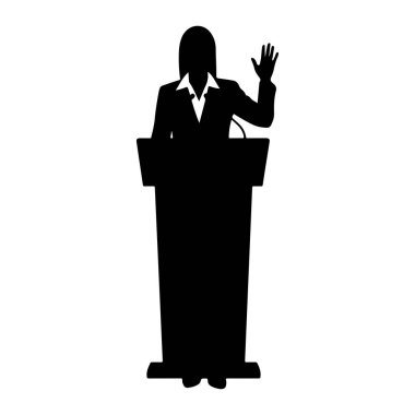 Siyah bir kadın silueti podyumun arkasında duruyor, öne bakıyor. O, yakalı bir gömlek ve ceket giyiyor. Sağ eli bir el sallama hareketiyle kaldırıldı ve önünde podyuma bir mikrofon yerleştirildi. Arkaplan beyaz.