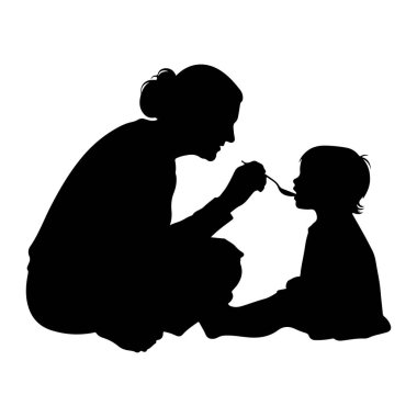 Siyah bir siluet bir annenin diz çöküp bir bebeği kaşıkla beslemesini tasvir eder. Bebek oturur ve yemeği kabul etmek için öne doğru eğilir. Arkaplan beyaz, figürlerin katıksız karşıtlığını vurguluyor.