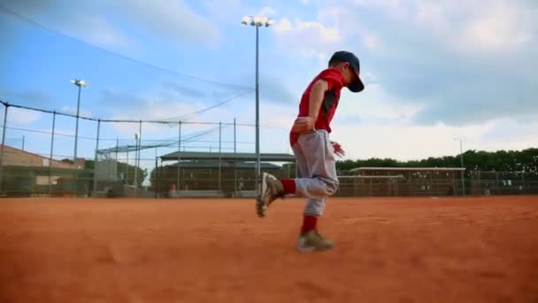 Slow Motion Little Kid Running First Base Sliding Baseball Field — Stock Video