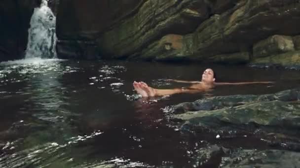 Cool Shot Woman Floating Smiling Relaxing River Waterfall — Stock Video