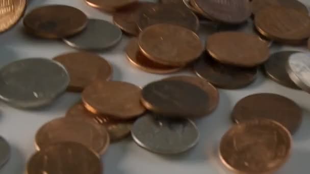 U.S. coins flipping on a table in super slow motion — Stock Video