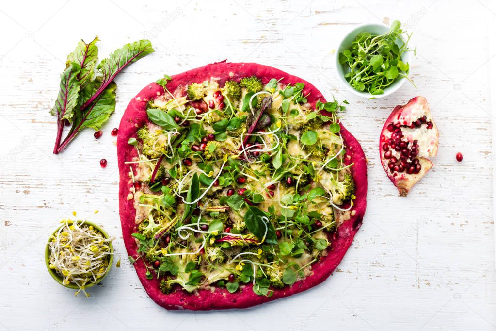 Purple beetroot dough, vegetables and sprouis pizza, Healthy fast food, white background
