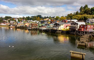 Houses in castro on Chiloe island Chile known as palafitos clipart