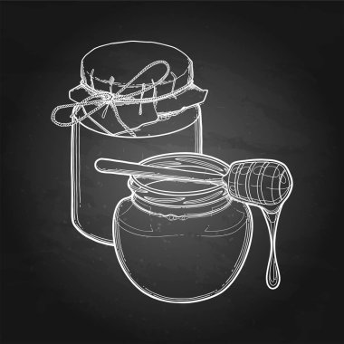 Damlatma ile süslenmiş farklı türde baldan iki suluboya şişesi.