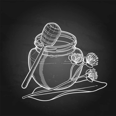 Ihlamur çiçekleri ile süslenmiş grafik bal şişesi