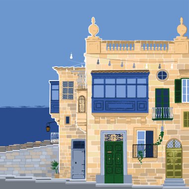 Geleneksel Malta Valletta evleri kumlu taştan yapılmış ve arka planda deniz var..