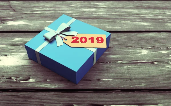      Yeni yıl 2019 yaratıcı tasarım konsepti hediye kutusu ve etiket - 3d render resim 