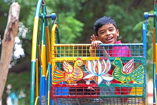 Excited Kid Riding Ferris Wheel — Stockfoto