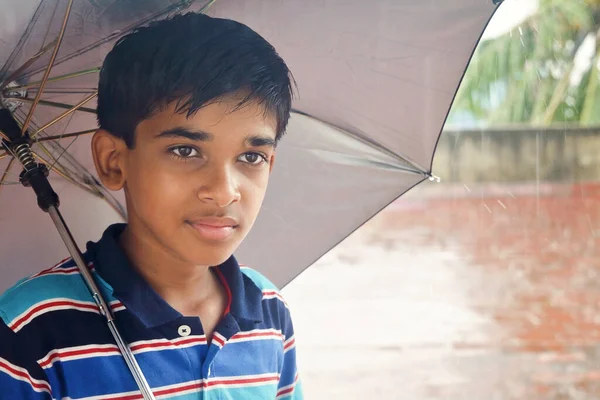 Portrait Young Boy Enjoying Rain — Stockfoto