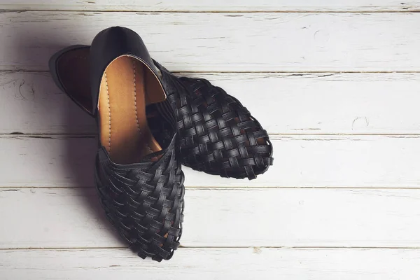 Girl Stylish Leather Shoes Wooden Table — Stock Photo, Image