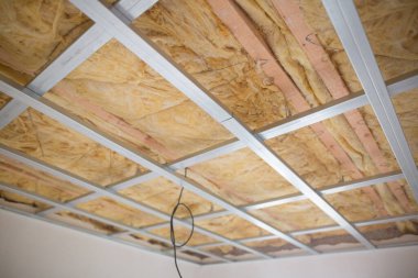 Alçıpan için yün yalıtımı, yeni bir ev inşa etmek.