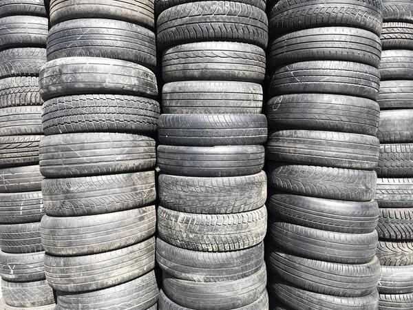 Old tires stacked in stacks.Background. Texture.