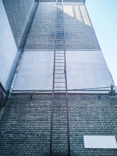 Fire Escape Attached Brick Building Silloutted Blue Sky — Stock Photo, Image