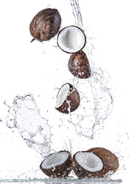 Fresh fruit, coconut mix on white background.Frisches Obst, Kokosmischung auf weiem Hintergrund.