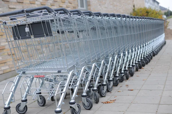Empty Metallic Shopping Carts Supermarket — Stock Photo, Image