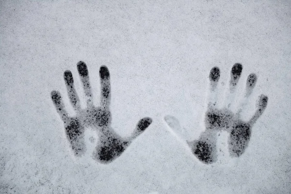 Handprints on the snow, background image